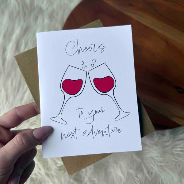 "Cheers To Your Next Adventure" Wine Glasses Greeting Card