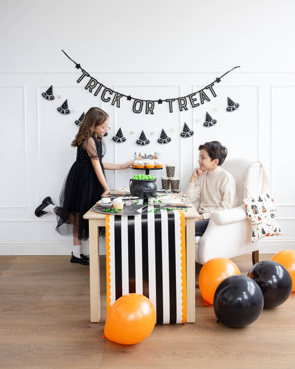 Orange and Black Striped Paper Table Runner